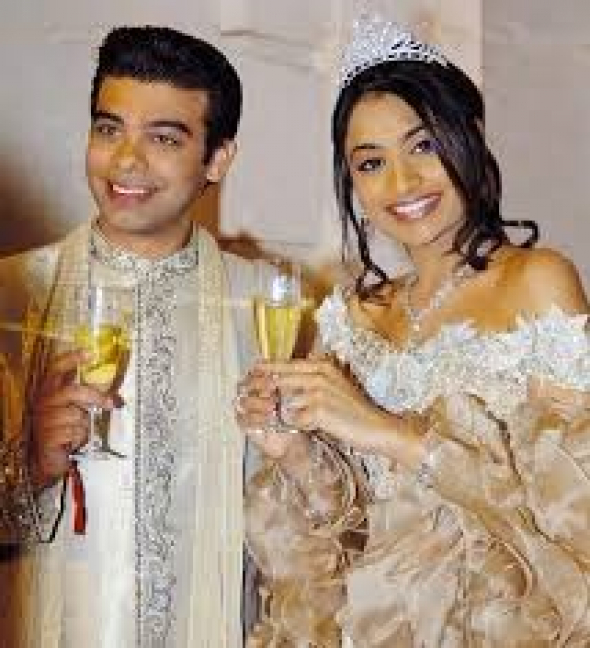 10. Vanisha Mittal a Amit Bhatia 